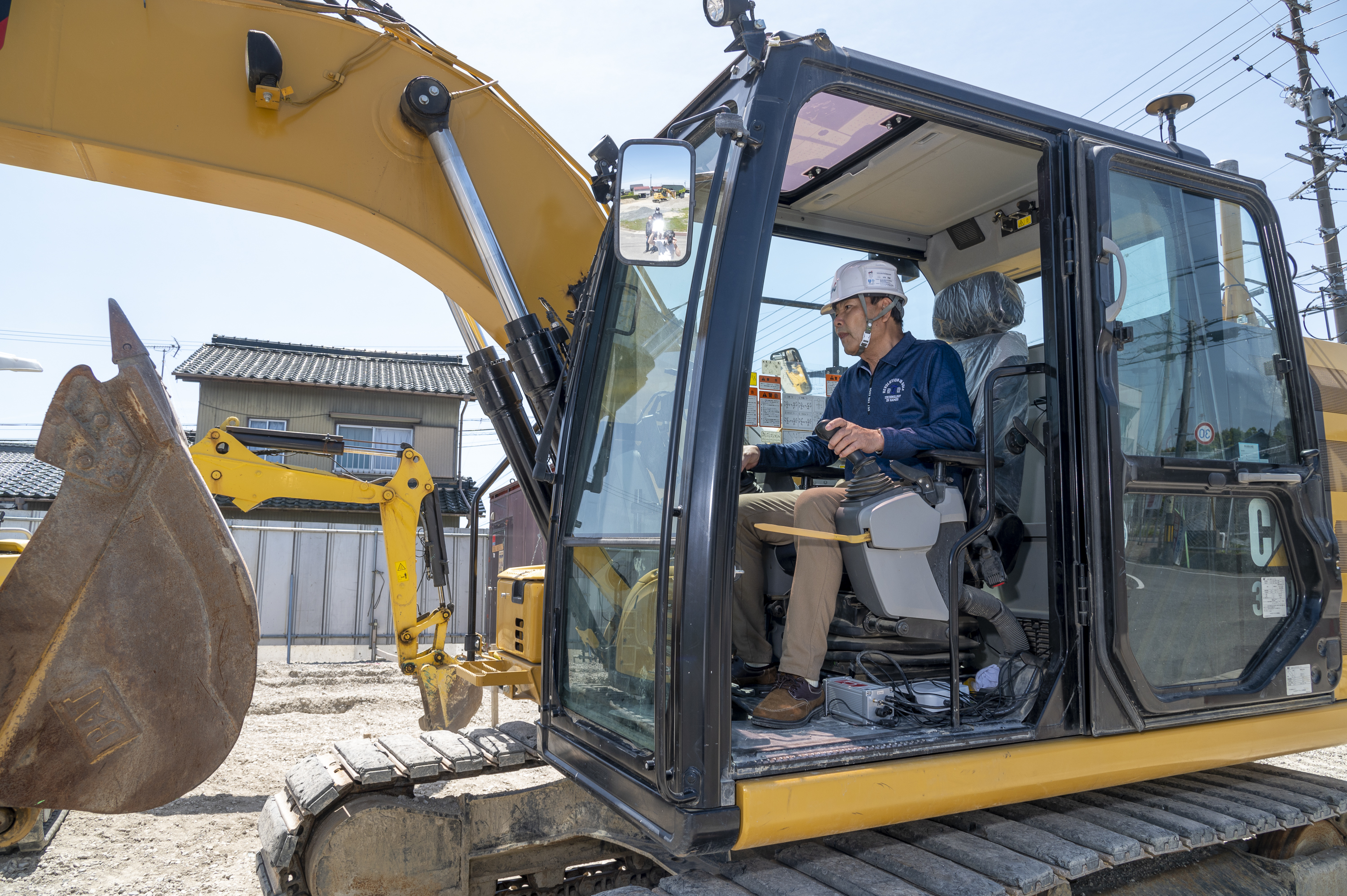 Excavator with Waktech MGS